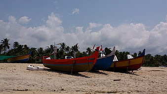 Colorful Fishing Boats on Tropical Sandy Beach