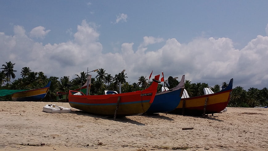 Colorful Fishing Boats on Tropical Sandy Beach