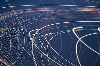 Abstract Blue Light Trails and Motion Lines Background