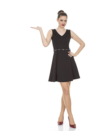 Woman in Black Dress Gesturing with Hand on White Background