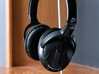 Black Over-Ear Headphones on a Stand