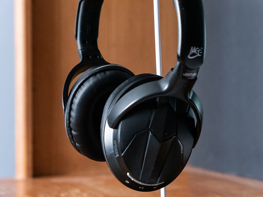 Black Over-Ear Headphones on a Stand