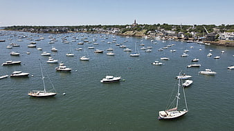 Aerial view of harbor filled with sailboats and yachts