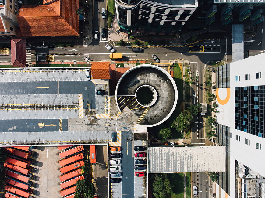 Aerial View of Urban Architecture and Parking Lot