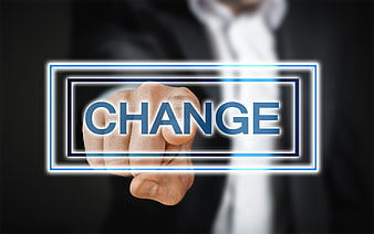 Businessman Hand Pressing Change Button on Digital Interface