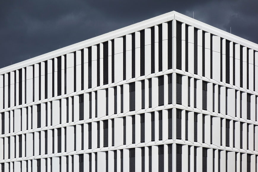 Modern White Building Facade with Vertical Lines