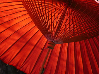 Close-up of traditional red Japanese paper parasol underside