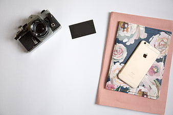 Vintage Camera and Smartphone Flat Lay on White Background
