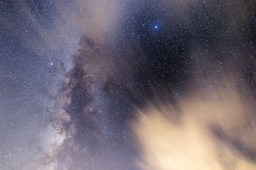 Milky Way Galaxy Night Sky with Clouds and Stars