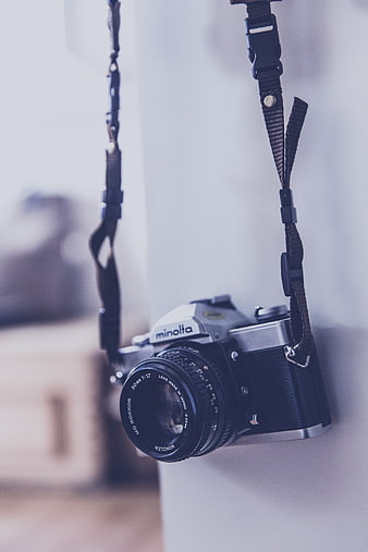 Vintage Minolta SLR Film Camera Hanging on Strap