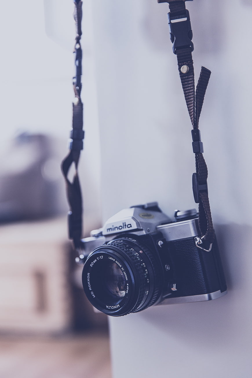 Vintage Minolta SLR Film Camera Hanging on Strap