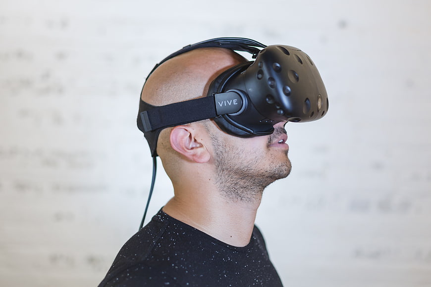 Man Wearing HTC Vive Virtual Reality Headset in Profile