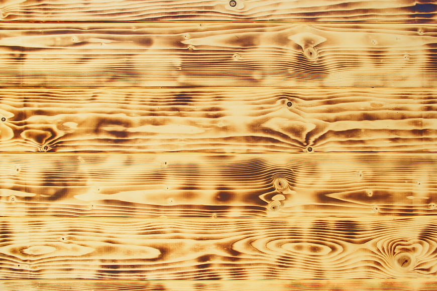 Burnt Wood Texture Background with Charred Planks