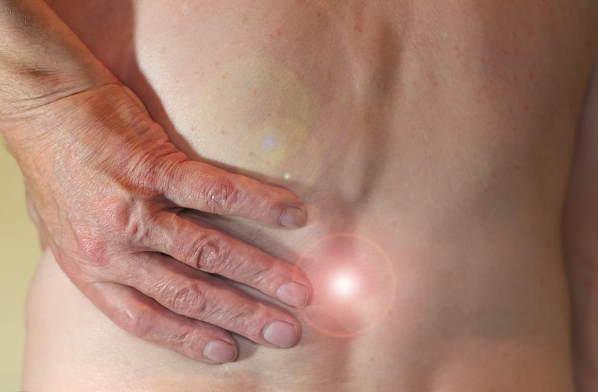 Senior Woman Holding Lower Back With Pain Indicator