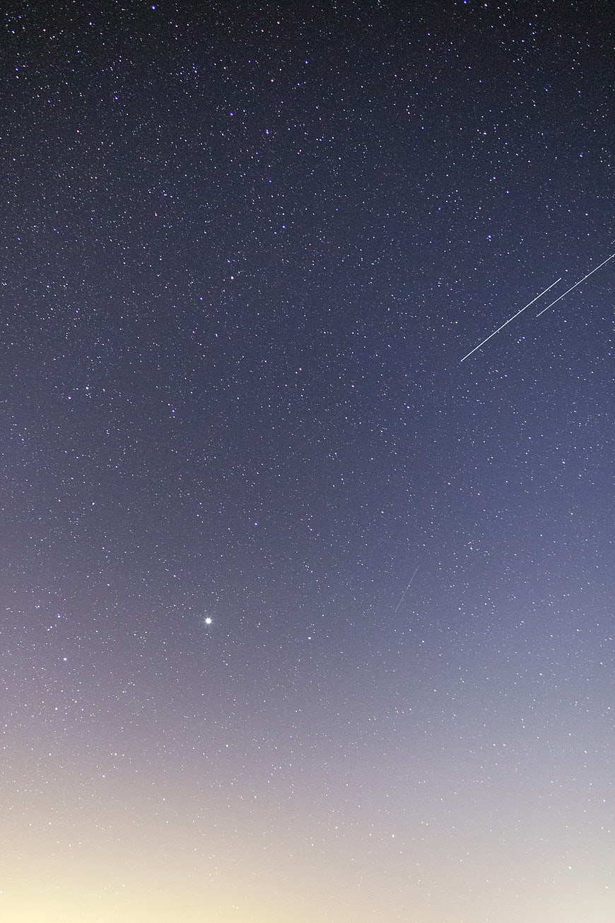 Starry Night Sky with Shooting Stars and Gradient Background