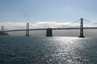 San Francisco Bay Bridge spanning the water on a sunny day
