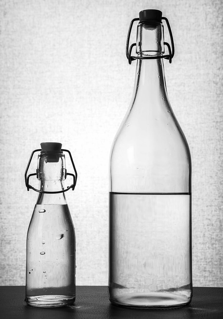Black and White Glass Bottles with Water