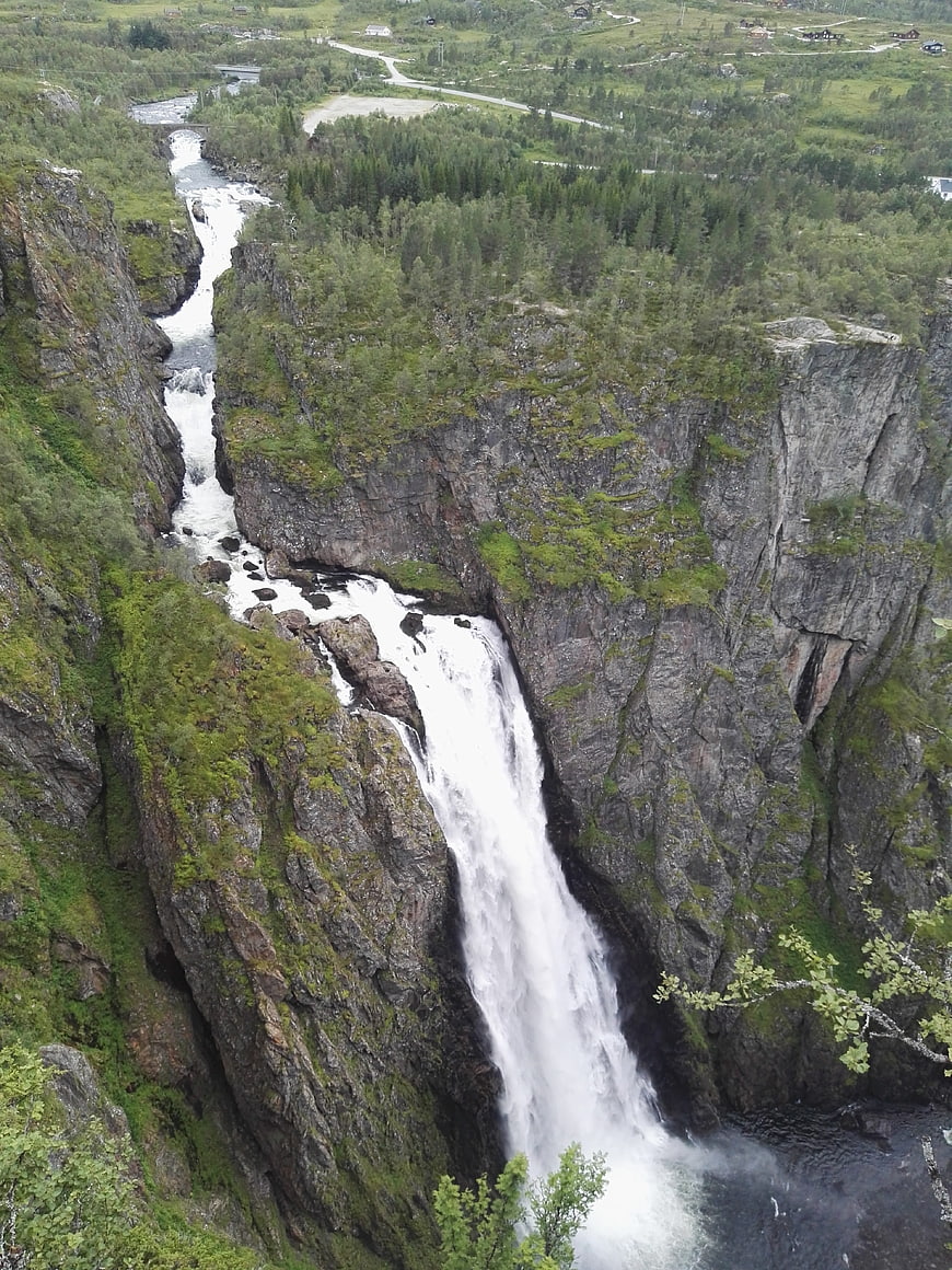 High Angle View of Powerful Waterfall in Green Norwegian Canyon