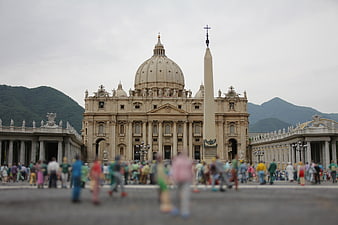 St. Peter's Basilica and Obelisk in Vatican City with Blurred Crowd