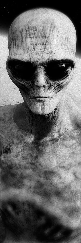 Black and white portrait of a humanoid alien with large dark eyes