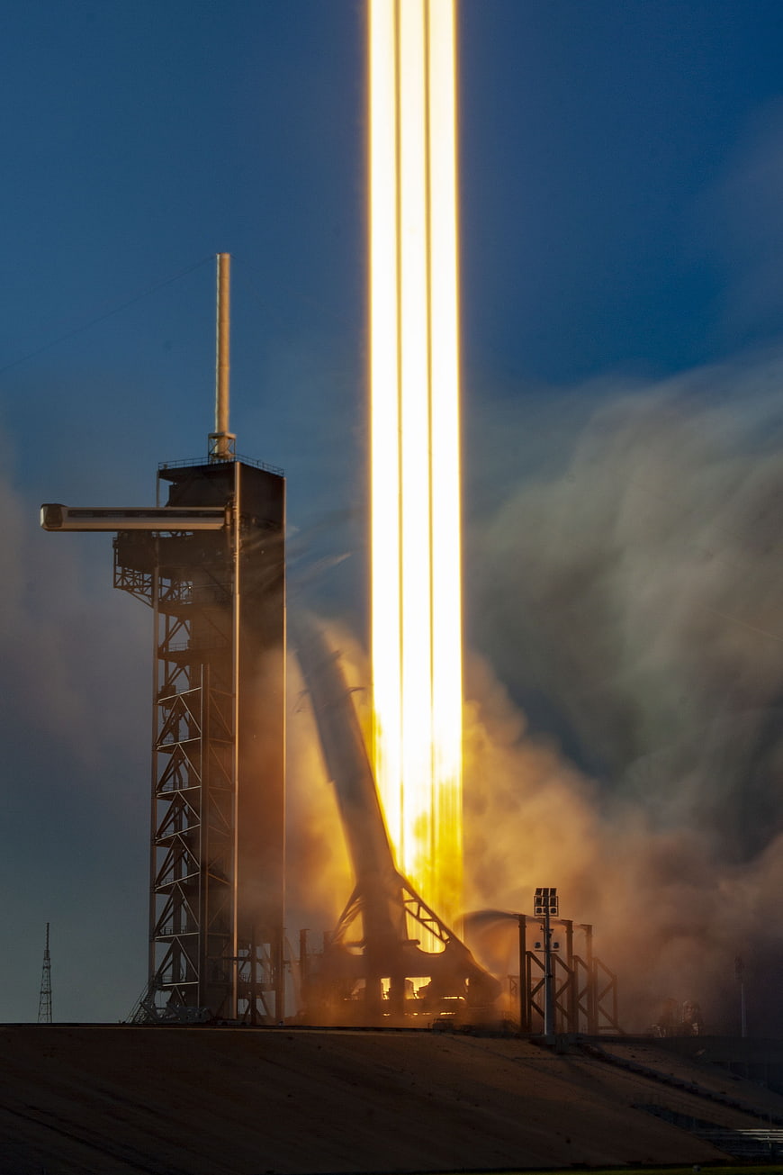 Rocket Launch Liftoff with Bright Flame Trail