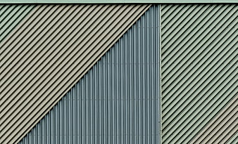 Abstract geometric pattern of corrugated metal siding
