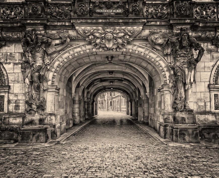 Historic Sandstone Archway Passage In Dresden Old Town