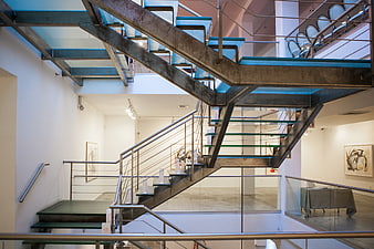Modern industrial steel staircase in art gallery interior