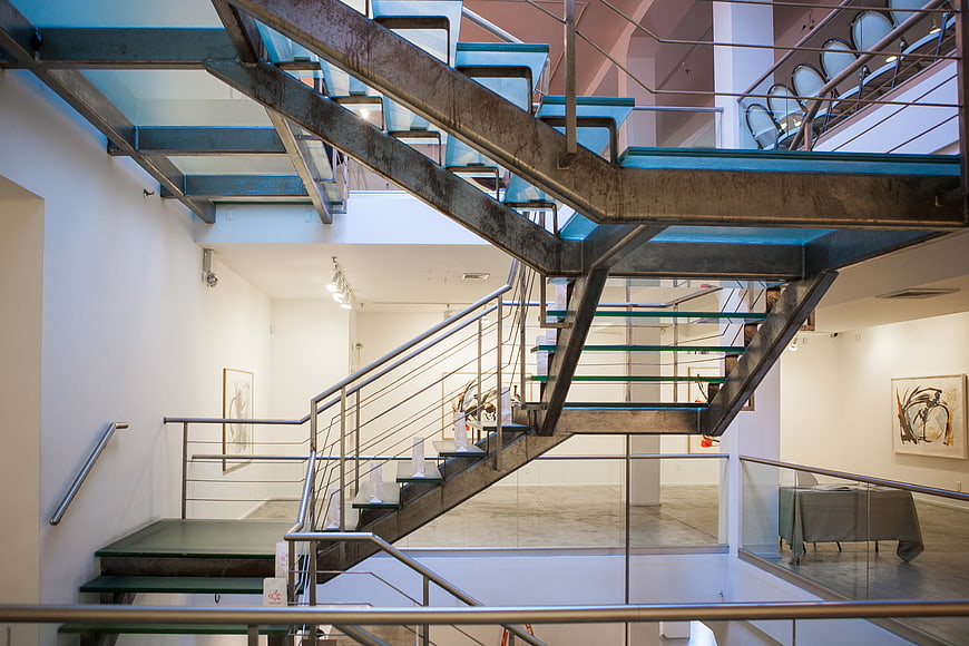 Modern industrial steel staircase in art gallery interior