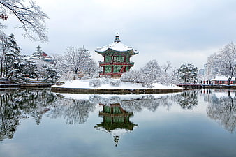 Traditional Korean Pavilion in Snowy Winter Landscape
