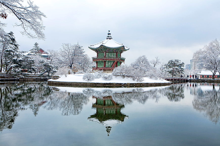 Traditional Korean Pavilion in Snowy Winter Landscape