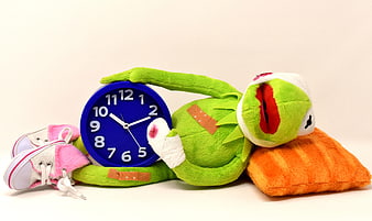Injured Green Frog Plushie With Bandages And Blue Clock