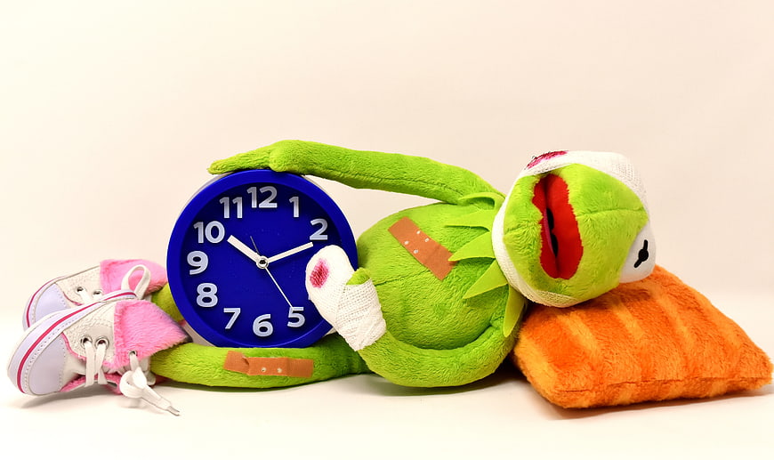 Injured Green Frog Plushie With Bandages And Blue Clock
