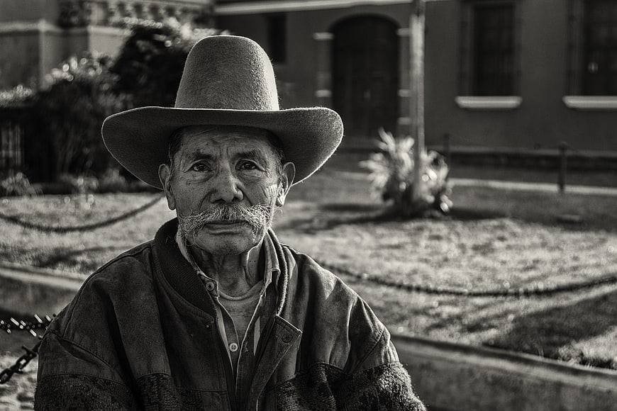 Portrait of elderly man in hat in Antigua Guatemala