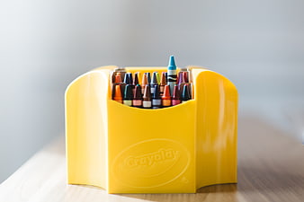Yellow Crayola Crayon Holder on Wooden Table