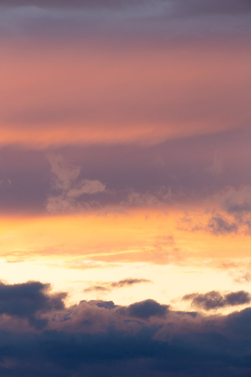 Colorful sunset sky with dramatic clouds and warm hues