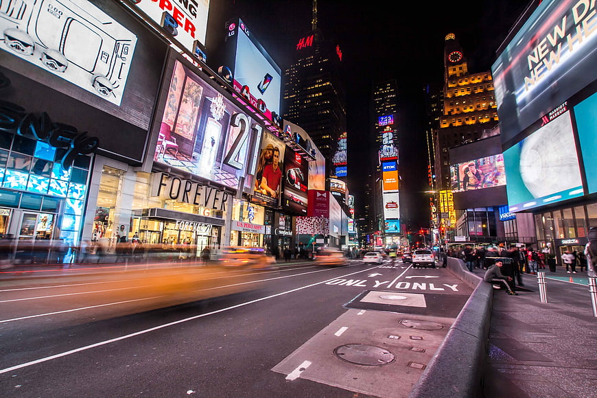 Night view of Times Square New York City with traffic