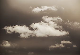 Dramatic Sepia Clouds in Moody Sky Background