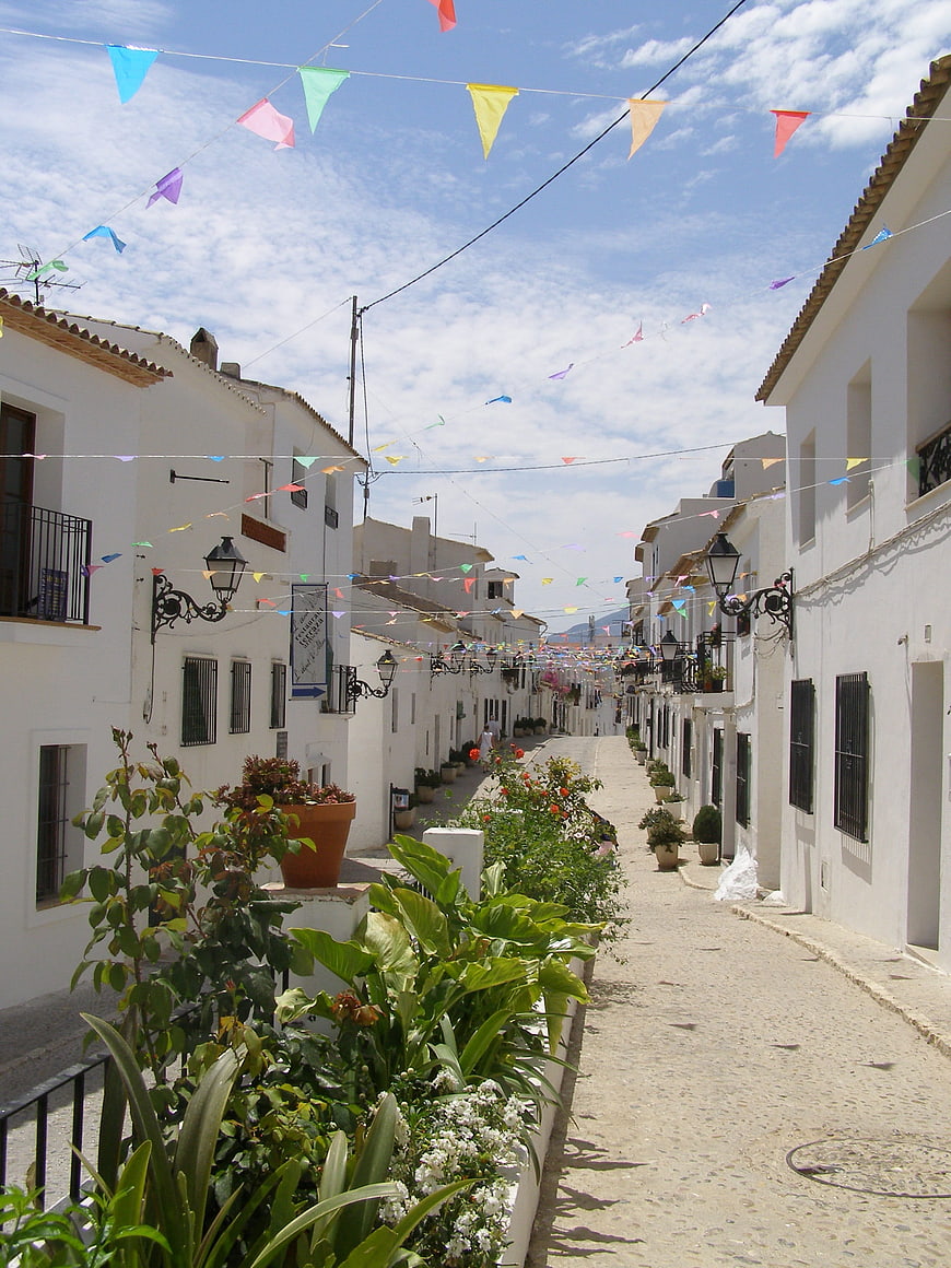 White Spanish Village Street with Colorful Bunting