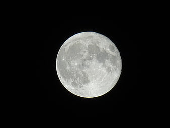 Full moon close-up against a pitch-black night sky