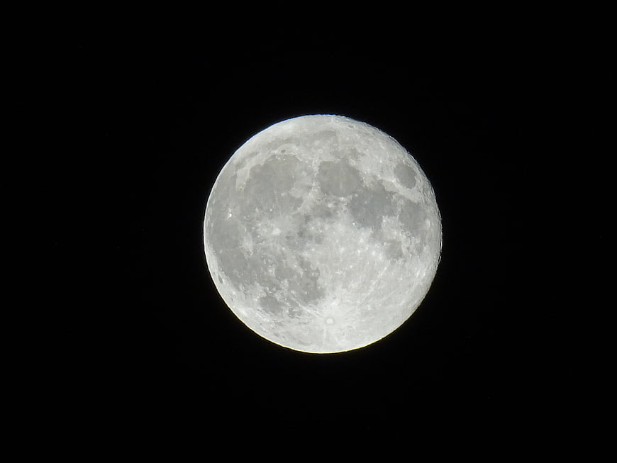 Full moon close-up against a pitch-black night sky