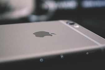Close-up of Silver Smartphone Back with Apple Logo