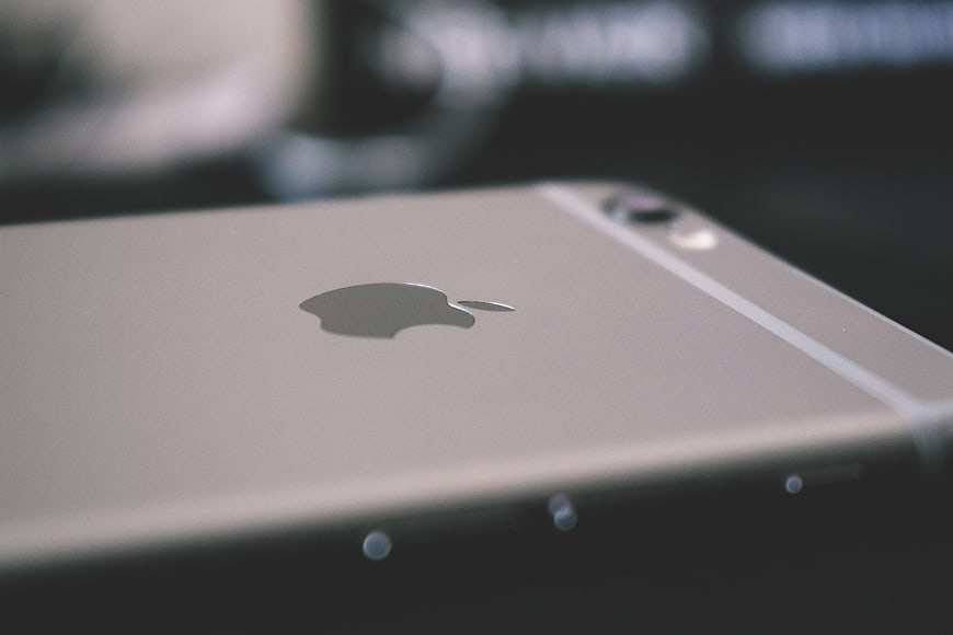 Close-up of Silver Smartphone Back with Apple Logo