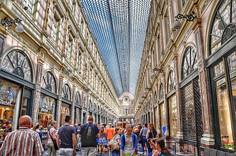 Interior View of Historic Glass Roofed Shopping Arcade With Pedestrians