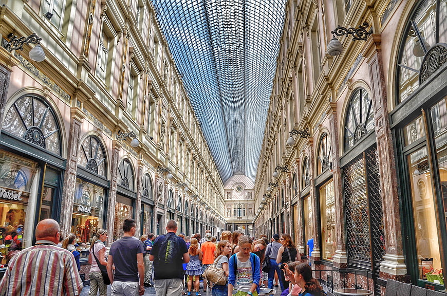 Interior View of Historic Glass Roofed Shopping Arcade With Pedestrians