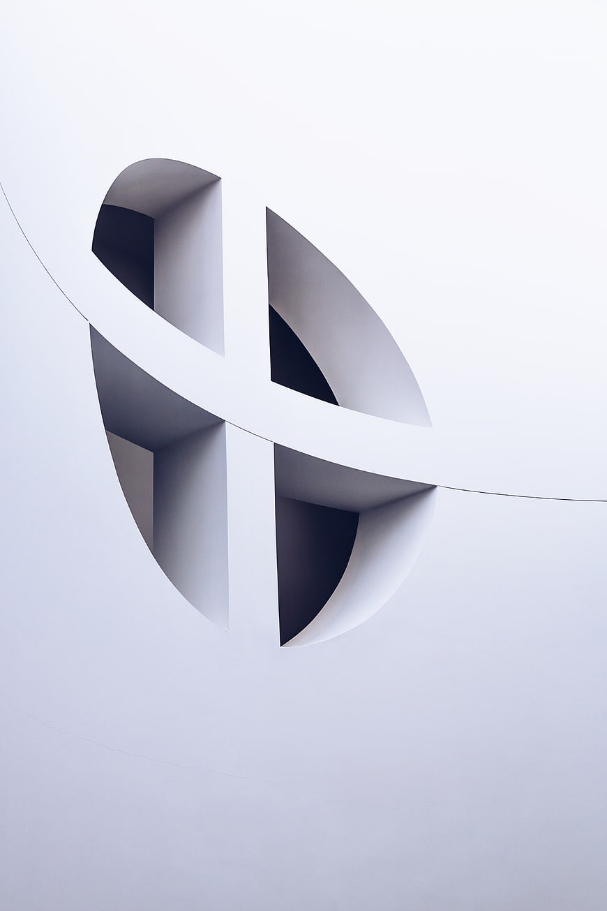 Minimalist White Architectural Detail with Curved Window