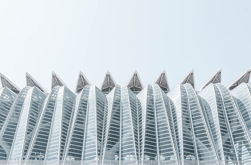 Modern glass architecture with curved geometric structures