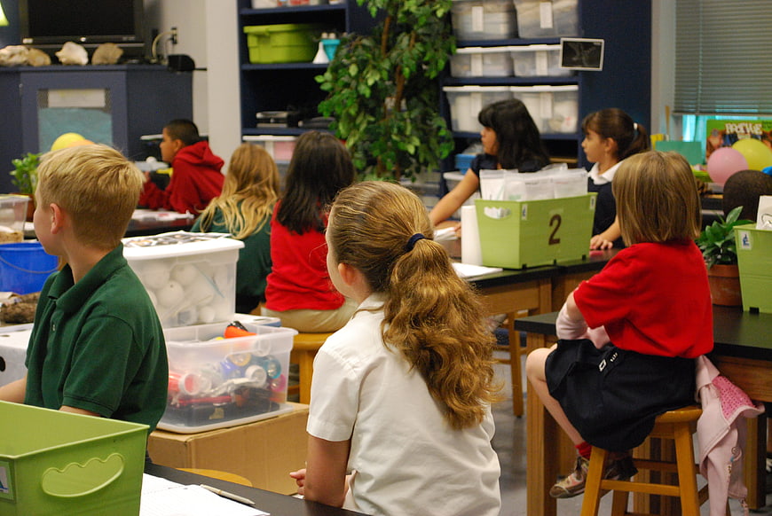 Elementary School Students Working Together In A Science Classroom