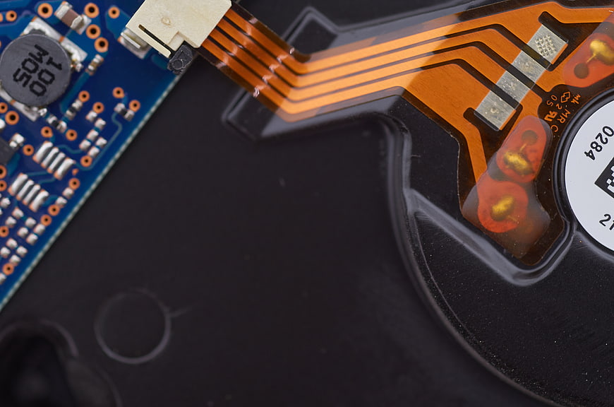 Macro shot of electronic circuit board and flexible ribbon cable