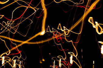 Abstract light trails on black background